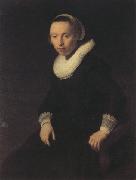 REMBRANDT Harmenszoon van Rijn, Portrait of a young woman seted, (mk330